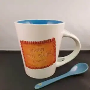 Mug bleu et sa cuillère intégrée